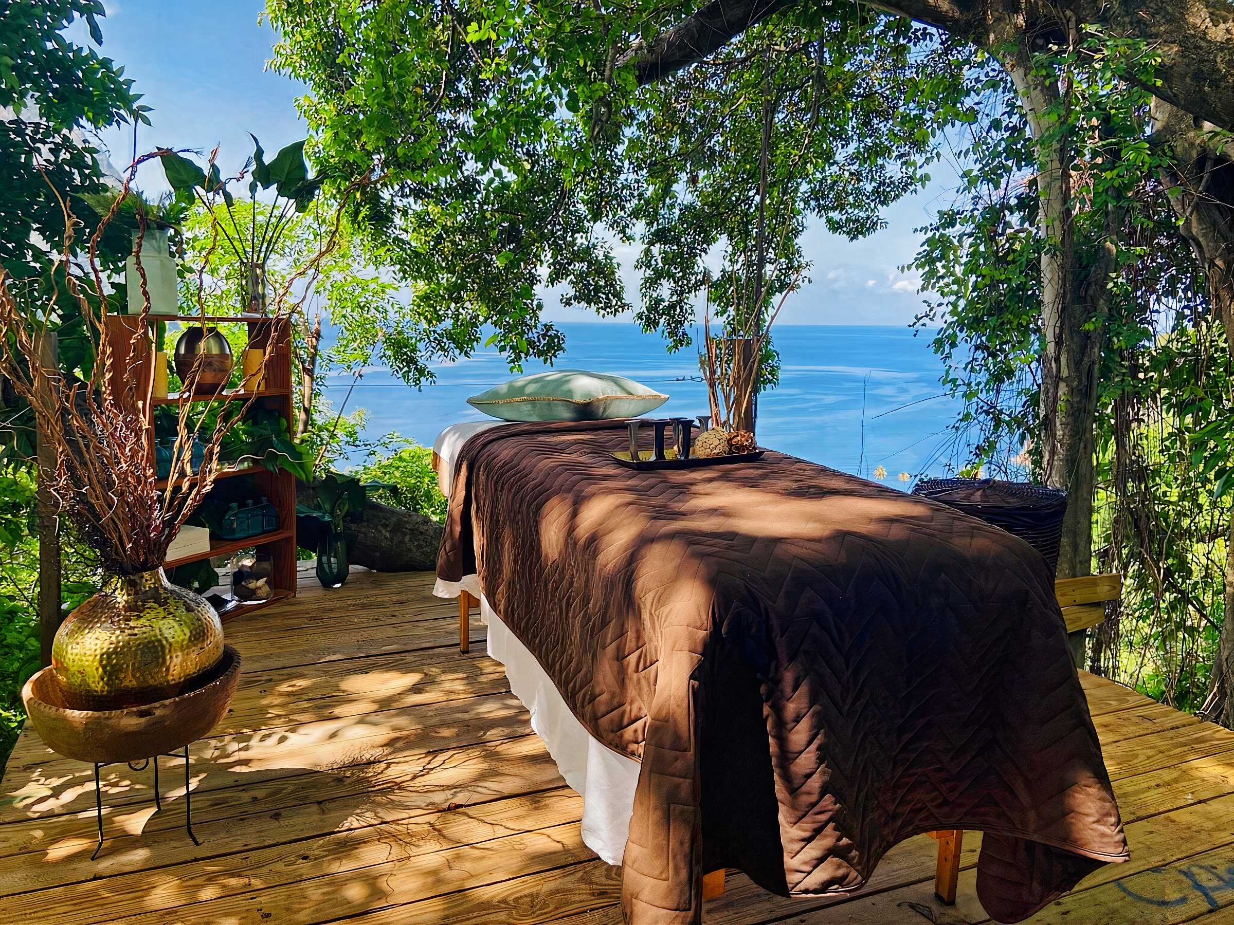 Massage table on the spa deck at Green Fig Resort, facing the Pitons