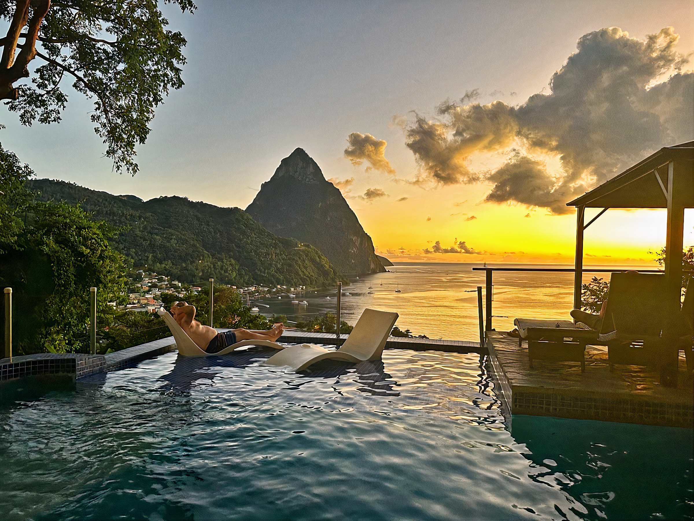 The infinity pool at Green Fig Resort & Spa at sunset