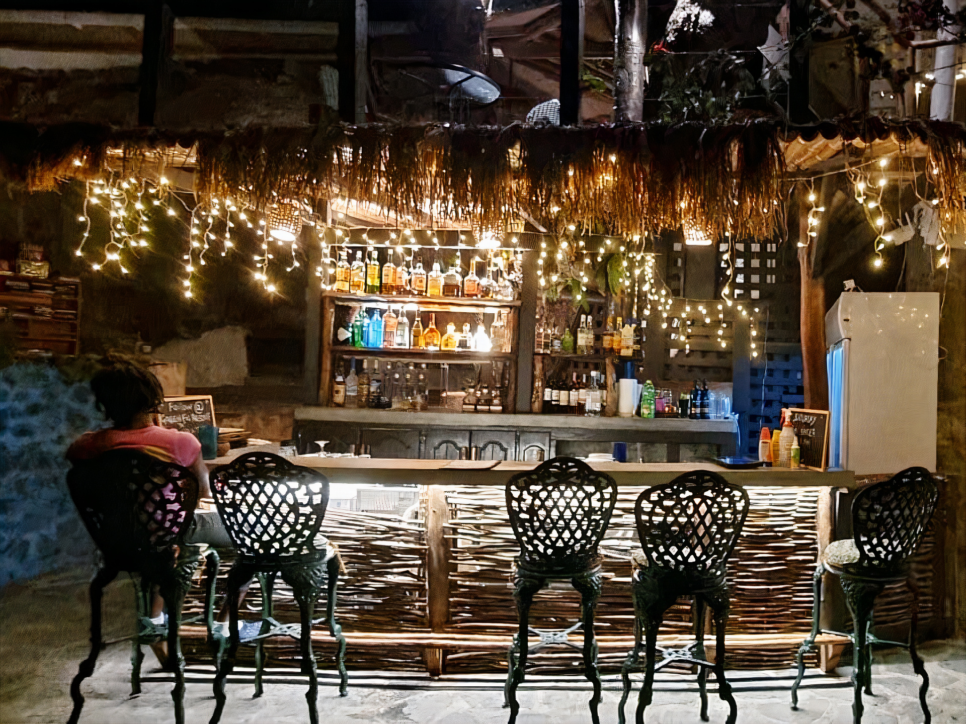The bar at Saltfish, lit with fairy lights